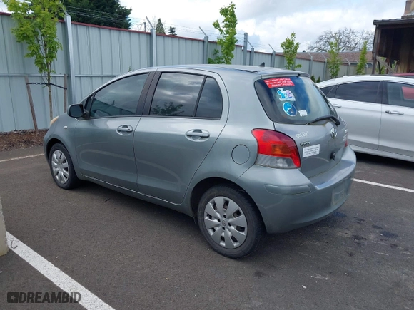 2009 Toyota Yaris with VIN JTDKT903295237216, listed as a IAAI auction lot 42087676 with 158,341 mi miles. Bid and sale history available at carsss.com. Image 3.