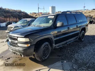 2002 Chevrolet Suburban Z71 with VIN 3GNFK16T12G256875, listed as a Copart auction lot 87745445 with 294,778 mi miles and Salvage Title. Bid and sale history available at carsss.com. Image 1.
