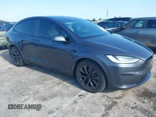 2022 Tesla Model X with VIN 7SAXCDE54NF342256, listed as a IAAI auction lot 41991212 with 28,740 mi miles and . Bid and sale history available at DreamBid. Image 1.