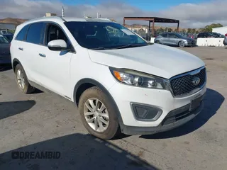 2016 Kia Sorento LX with VIN 5XYPGDA51GG135486, listed as a IAAI auction lot 42795339 with 157,279 mi miles and . Bid and sale history available at DreamBid. Image 1.