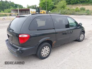 2006 Chrysler Town & Country LWB LX with VIN 2A4GP44R06R604215, listed as a IAAI auction lot 39411993 with 289,048 mi miles. Bid and sale history available at carsss.com. Image 4.