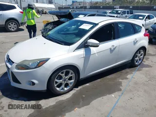 2014 Ford Focus Titanium with VIN 1FADP3N27EL330366, listed as a IAAI auction lot 42719377 with 97,009 mi miles and . Bid and sale history available at DreamBid. Image 2.