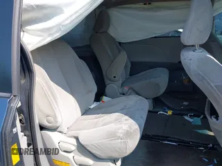 2013 Toyota Sienna LE with VIN 5TDJK3DC6DS070951, listed as a IAAI auction lot 42468510 with 235,537 mi miles and . Bid and sale history available at DreamBid. Image 8.