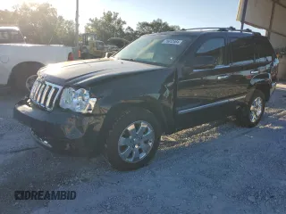 2009 Jeep Grand Cherokee with VIN 1J8HR68TX9C540051, listed as a Copart auction lot 75612464 with 244,113 mi miles and Salvage title. Bid and sale history available at DreamBid. Image 1.