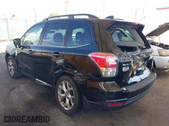 2018 Subaru Forester Touring z VIN JF2SJAWC2JH407593, wystawiony jako IAAI lot #42014886 z przebiegiem 78 349 mil mil oraz . Historia ofert i sprzedaży dostępna na DreamBid. Obrazek 3.
