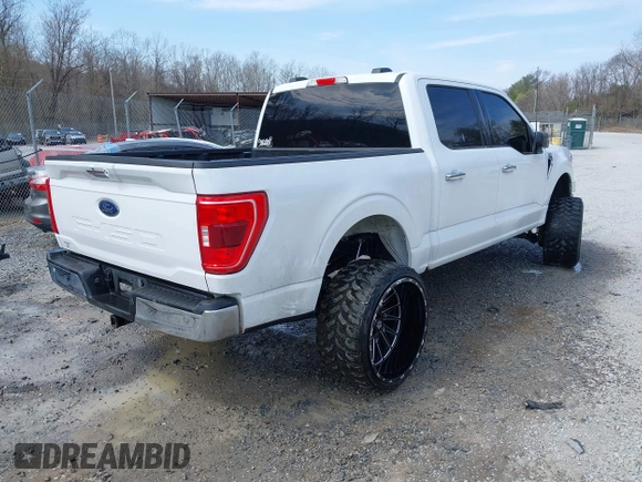 2023 Ford F-150 XL with VIN 1FTEW1C58PKE81292, listed as a IAAI auction lot 41900494 with 34,753 mi miles and . Bid and sale history available at DreamBid. Image 4.