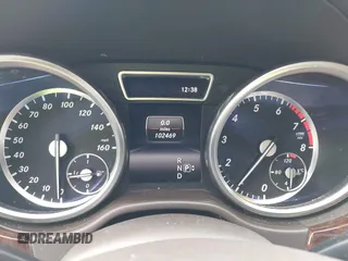 2014 Mercedes-Benz GL-Class GL 550 with VIN 4JGDF7DE2EA313661, listed as a IAAI auction lot 41214931 with 102,469 mi miles. Bid and sale history available at carsss.com. Image 7.