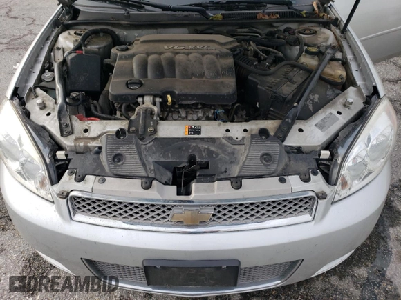 2015 Chevrolet Impala LS with VIN 2G1WA5E32F1123103, listed as a Copart auction lot 56298335 with 176,800 mi miles and Salvage title. Bid and sale history available at DreamBid. Image 11.