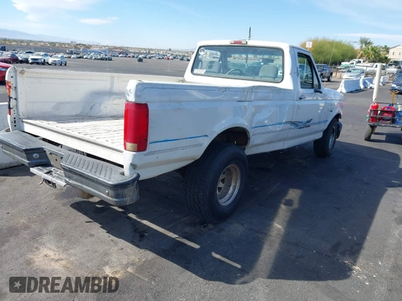 1995 Ford F-150 with VIN 1FTEF15Y0SLA56417, listed as a IAAI auction lot 41912598 with 205,158 mi miles. Bid and sale history available at carsss.com. Image 4.