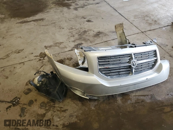 2011 Dodge Caliber Mainstreet z VIN 1B3CB3HAXBD237629, wystawiony jako Copart lot #56727465 z przebiegiem 155 166 mil mil oraz Szkoda całkowita • Salvage title. Historia ofert i sprzedaży dostępna na DreamBid. Obrazek 12.