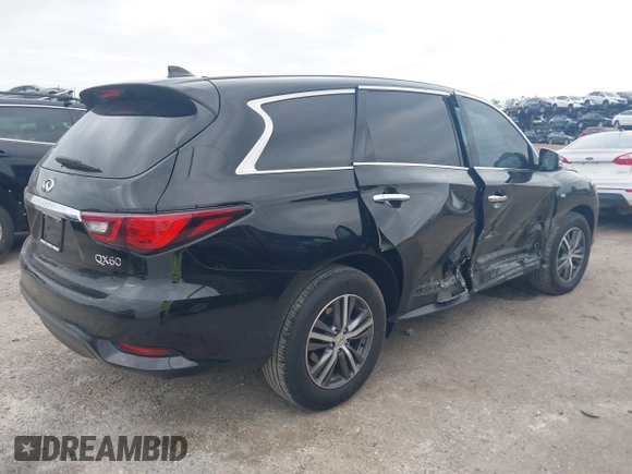 2020 Infiniti QX60 Pure with VIN 5N1DL0MN0LC527050, listed as a IAAI auction lot 41734032 with 71,204 mi miles and . Bid and sale history available at DreamBid. Image 4.
