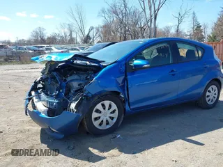 2013 Toyota Prius One z VIN JTDKDTB33D1555756, wystawiony jako IAAI lot #41962684 z przebiegiem Nie podano mil oraz . Historia ofert i sprzedaży dostępna na DreamBid. Obrazek 16.