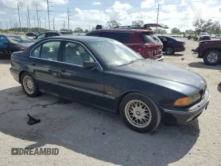 2000 BMW 5 Series 528iA with VIN WBADM6340YGU16735, listed as a Copart auction lot 77249644 with 0 mi miles and Salvage Title. Bid and sale history available at carsss.com. Image 4.