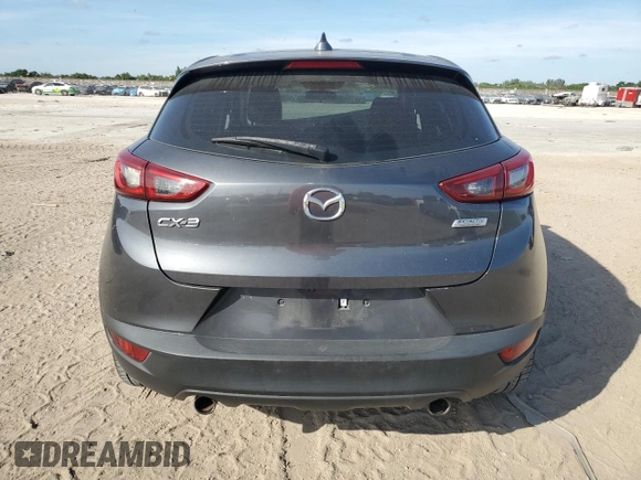 2017 Mazda CX-3 Touring z VIN JM1DKDC77H0151148, wystawiony jako Copart lot #81897434 z przebiegiem Nie podano mil oraz Szkoda całkowita • Salvage title. Historia ofert i sprzedaży dostępna na DreamBid. Obrazek 6.