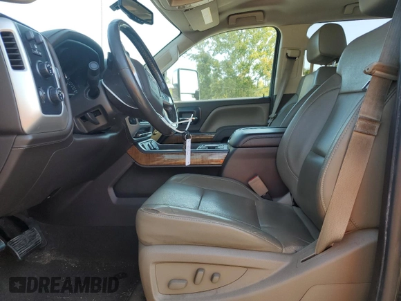 2015 GMC Sierra 2500HD SLT with VIN 1GT12ZEG4FF160722, listed as a Copart auction lot 75458644 with 337,580 mi miles and Salvage title. Bid and sale history available at DreamBid. Image 7.