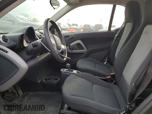 2014 Smart fortwo Pure z VIN WMEEJ3BA0EK757231, wystawiony jako Copart lot #52346105 z przebiegiem 142 976 mil mil oraz Czysty tytuł • Clean title. Historia ofert i sprzedaży dostępna na DreamBid. Obrazek 7.