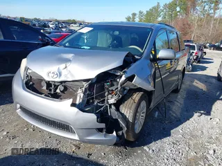 2011 Toyota Sienna XLE AAS with VIN 5TDYK3DC9BS103193, listed as a IAAI auction lot 41073036 with 175,474 mi miles and . Bid and sale history available at DreamBid. Image 6.