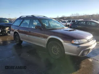 1999 Subaru Legacy Outback with VIN 4S3BG6851X7637598, listed as a Copart auction lot 83469134 with 207,692 mi miles and Salvage title. Bid and sale history available at DreamBid. Image 4.