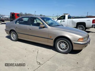 2000 BMW 5 Series 528iA with VIN WBADM6340YGU22292, listed as a Copart auction lot 52256455 with 141,316 mi miles and Clean Title. Bid and sale history available at carsss.com. Image 4.