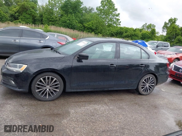 2016 Volkswagen Jetta Sport z VIN 3VWD17AJ5GM244200, wystawiony jako IAAI lot #42340056 z przebiegiem 111 012 mil mil oraz . Historia ofert i sprzedaży dostępna na DreamBid. Obrazek 13.