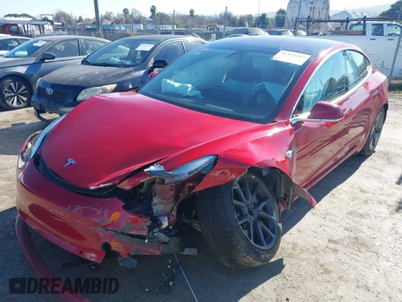 2018 Tesla Model 3 Long Range Battery z VIN 5YJ3E1EA4JF022284, wystawiony jako IAAI lot #41422203 z przebiegiem 71 521 mil mil oraz . Historia ofert i sprzedaży dostępna na DreamBid. Obrazek 6.
