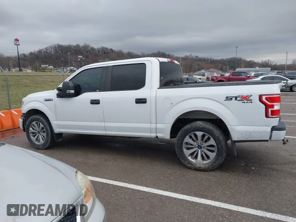 2018 Ford F-150 XL with VIN 1FTEW1E59JKD99284, listed as a IAAI auction lot 41203530 with 153,800 mi miles. Bid and sale history available at carsss.com. Image 14.