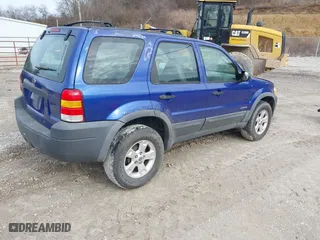 2006 Ford Escape XLT with VIN 1FMYU03146KB87070, listed as a IAAI auction lot 41451676 with 180,415 mi miles. Bid and sale history available at carsss.com. Image 4.