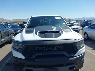 2022 Ram 1500 TRX with VIN 1C6SRFU95NN245954, listed as a IAAI auction lot 42032210 with 30,870 mi miles and . Bid and sale history available at DreamBid. Image 6.