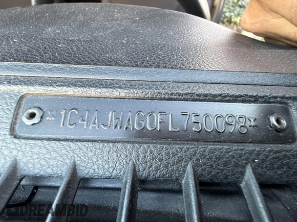 2015 Jeep Wrangler Sport with VIN 1C4AJWAG0FL750098, listed as a IAAI auction lot 41266454 with 77,115 mi miles. Bid and sale history available at carsss.com. Image 9.