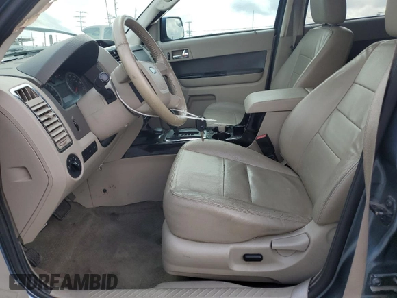 2010 Ford Escape Hybrid with VIN 1FMCU4K30AKC51022, listed as a Copart auction lot 51014615 with 128,275 mi miles and Salvage title. Bid and sale history available at DreamBid. Image 7.