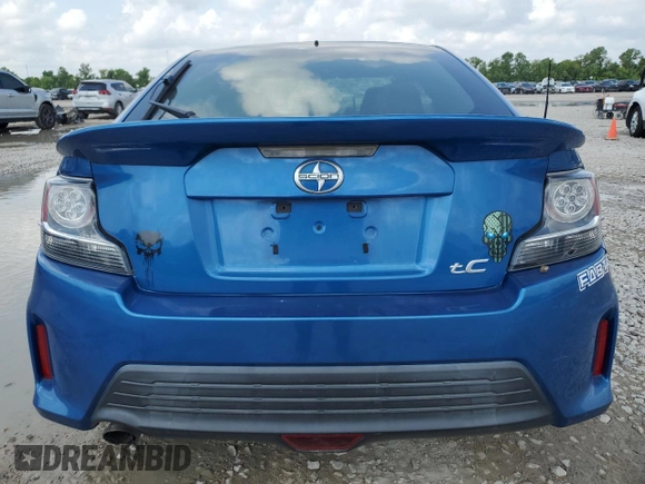2016 Scion tC z VIN JTKJF5C78GJ016405, wystawiony jako Copart lot #54265995 z przebiegiem 89 467 mil mil oraz Szkody całkowita. Historia ofert i sprzedaży dostępna na DreamBid. Obrazek 6.