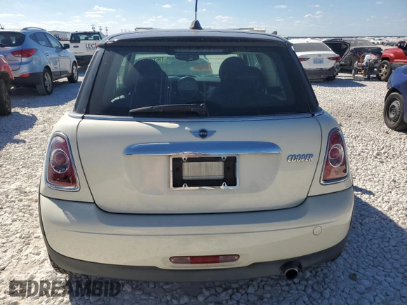 2013 MINI Hardtop with VIN WMWSU3C56DT682857, listed as a Copart auction lot 77677234 with 92,625 mi miles and Clean Title. Bid and sale history available at DreamBid. Image 6.
