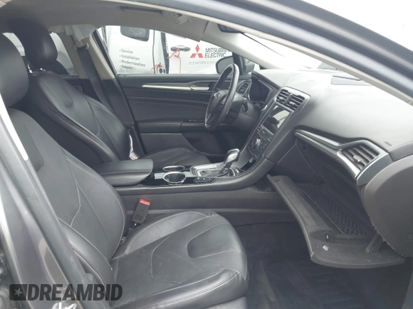 2013 Ford Fusion Titanium with VIN 3FA6P0SUXDR332271, listed as a IAAI auction lot 42174434 with 201,404 mi miles and . Bid and sale history available at DreamBid. Image 5.
