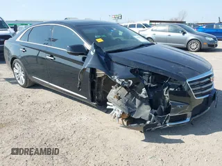 2018 Cadillac XTS Luxury with VIN 2G61M5S36J9120571, listed as a IAAI auction lot 41486816 with 77,302 mi miles. Bid and sale history available at carsss.com. Image 1.