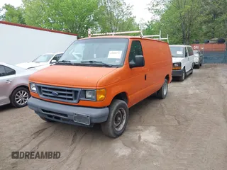 2007 Ford Econoline Cargo Commercial with VIN 1FTNE14WX7DB27840, listed as a IAAI auction lot 42095717 with 209,495 mi miles and . Bid and sale history available at DreamBid. Image 2.