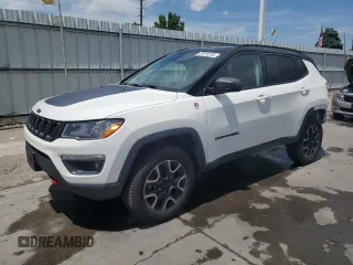 2020 Jeep Compass Trailhawk with VIN 3C4NJDDB1LT189240, listed as a Copart auction lot 57876235 with 70,309 mi miles and Salvage title. Bid and sale history available at DreamBid. Image 1.