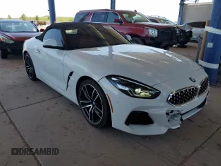 2020 BMW Z4 sDrive30i with VIN WBAHF3C0XLWW60530, listed as a Copart auction lot 57099555 with 20,464 mi miles and Salvage title. Bid and sale history available at DreamBid. Image 4.