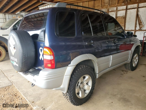 2000 Suzuki Grand Vitara JLX with VIN JS3TD62VXY4110167, listed as a Copart auction lot 77887674 with 126,214 mi miles and Salvage Title. Bid and sale history available at carsss.com. Image 3.