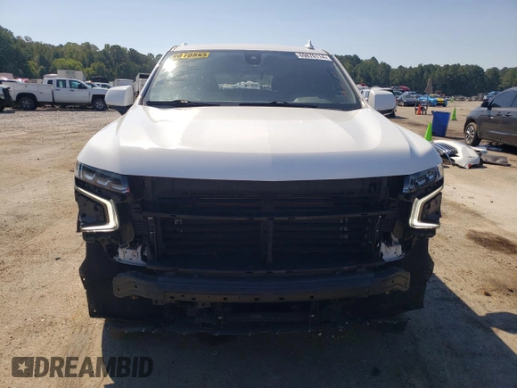 2021 Chevrolet Tahoe LT with VIN 1GNSCNKD4MR252131, listed as a Copart auction lot 69876114 with 99,192 mi miles and Salvage title. Bid and sale history available at DreamBid. Image 5.
