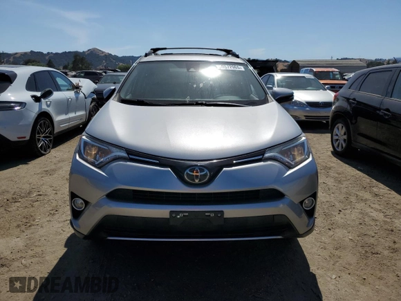 2018 Toyota RAV4 XLE с VIN JTMWFREV5JJ161845, выставлен на аукционе Copart как лот 60572965 с пробегом 85 045 миль миль и Списание • Salvage title. История ставок и продаж доступна на DreamBid. Изображение 5.
