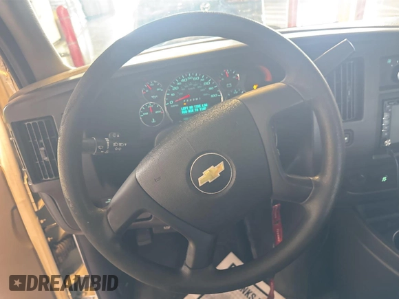 2011 Chevrolet Express Cargo with VIN 1GCWGFCA2B1173903, listed as a IAAI auction lot 42796147 with 110,763 mi miles and . Bid and sale history available at DreamBid. Image 12.