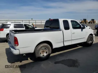 2003 Ford F-150 XL z VIN 2FTRX17253CA75533, wystawiony jako Copart lot #57361145 z przebiegiem 220 482 mil mil oraz Szkoda całkowita • Salvage title. Historia ofert i sprzedaży dostępna na DreamBid. Obrazek 3.
