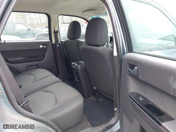 2010 Mazda Tribute Sport with VIN 4F2CY9C79AKM01295, listed as a IAAI auction lot 41962901 with 183,002 mi miles. Bid and sale history available at carsss.com. Image 8.