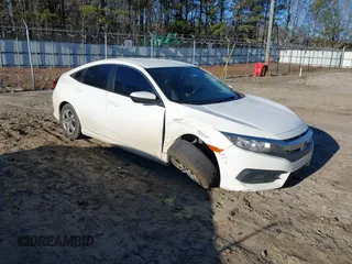 2017 Honda Civic LX z VIN 19XFC2F50HE007646, wystawiony jako IAAI lot #41360121 z przebiegiem 133 800 mil mil oraz . Historia ofert i sprzedaży dostępna na DreamBid. Obrazek 1.