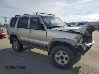 2001 Isuzu Trooper S with VIN JACDJ58X117J11550, listed as a Copart auction lot 46323185 with 236,762 mi miles and Salvage title. Bid and sale history available at DreamBid. Image 4.