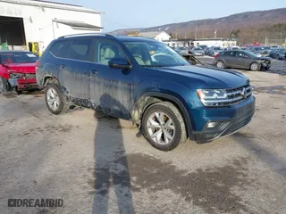 2018 Volkswagen Atlas 3.6L V6 SE with VIN 1V2LR2CA7JC549020, listed as a IAAI auction lot 41394217 with 106,477 mi miles. Bid and sale history available at carsss.com. Image 1.