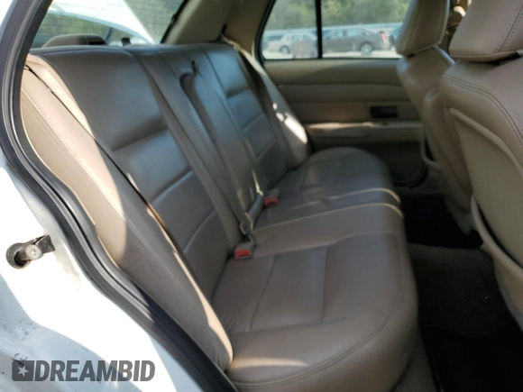 2003 Ford Crown Victoria LX z VIN 2FAFP74W03X209148, wystawiony jako Copart lot #53274575 z przebiegiem 127 739 mil mil oraz Szkody całkowita. Historia ofert i sprzedaży dostępna na DreamBid. Obrazek 10.