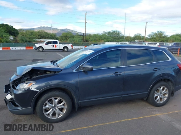 2014 Mazda CX-9 Sport with VIN JM3TB3BAXE0442006, listed as a IAAI auction lot 41430742 with 82,682 mi miles and . Bid and sale history available at DreamBid. Image 6.
