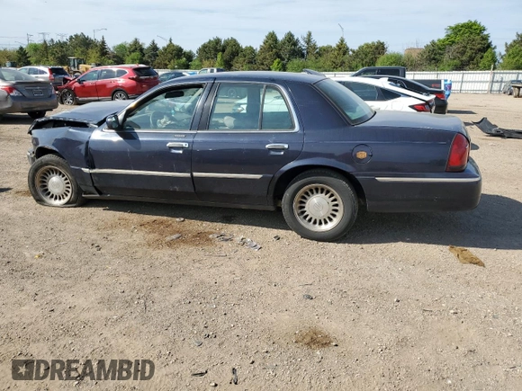 1999 Mercury Grand Marquis LS z VIN 2MEFM75W1XX635839, wystawiony jako Copart lot #55860735 z przebiegiem 114 963 mil mil oraz Szkoda całkowita • Salvage title. Historia ofert i sprzedaży dostępna na DreamBid. Obrazek 2.