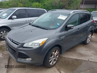 2014 Ford Escape Titanium with VIN 1FMCU0JX8EUD31028, listed as a IAAI auction lot 41943690 with 91,295 mi miles. Bid and sale history available at carsss.com. Image 2.